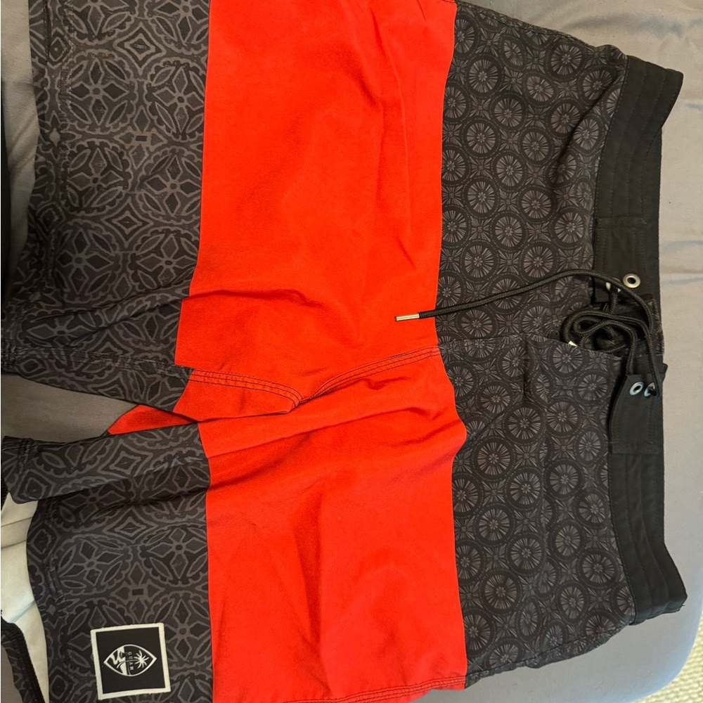 Red and Black Patterned Board Shorts